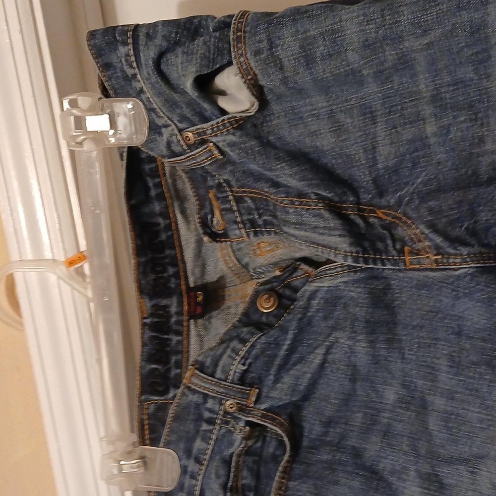 Men's blue jeans with front and back pockets